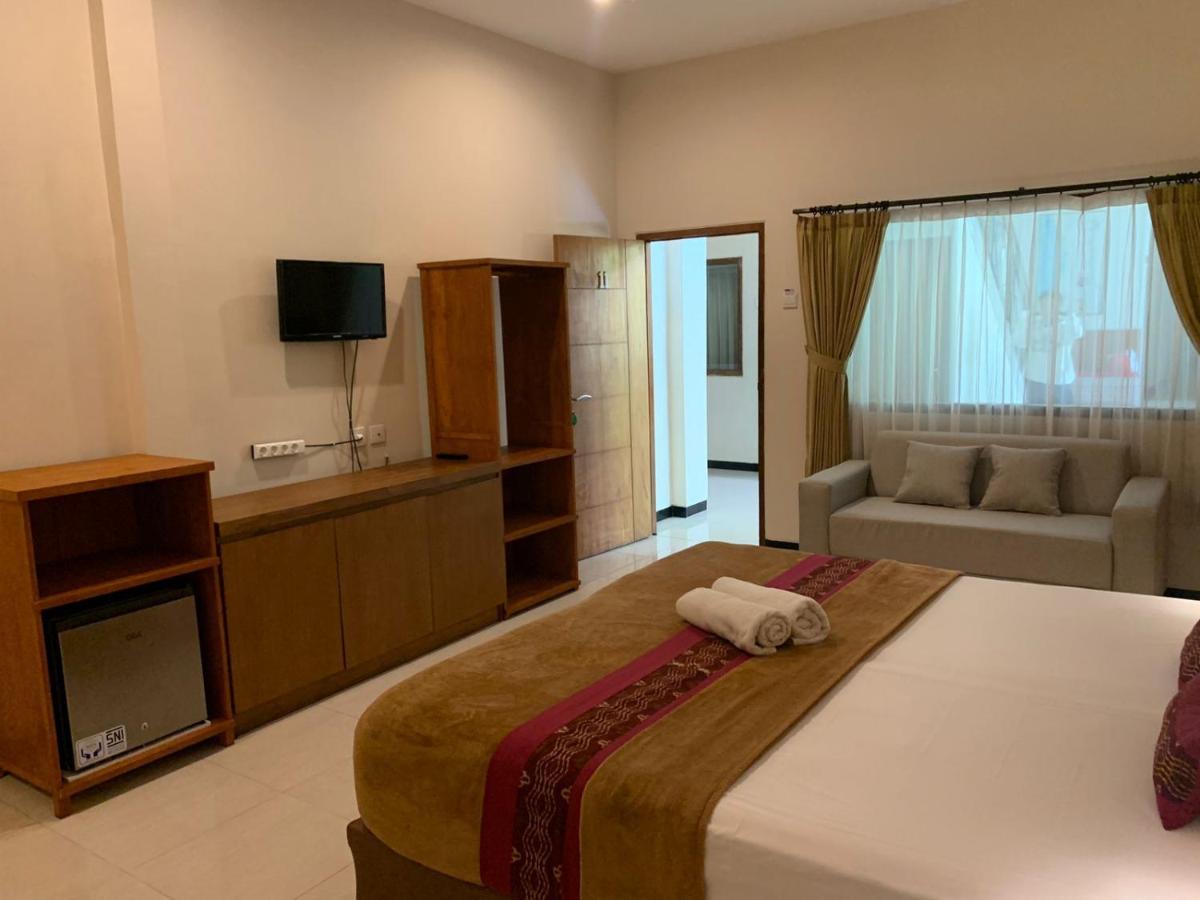 Kuta Suci Guesthouse Екстериор снимка
