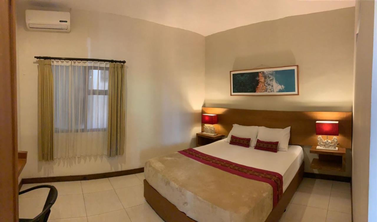 Kuta Suci Guesthouse Екстериор снимка