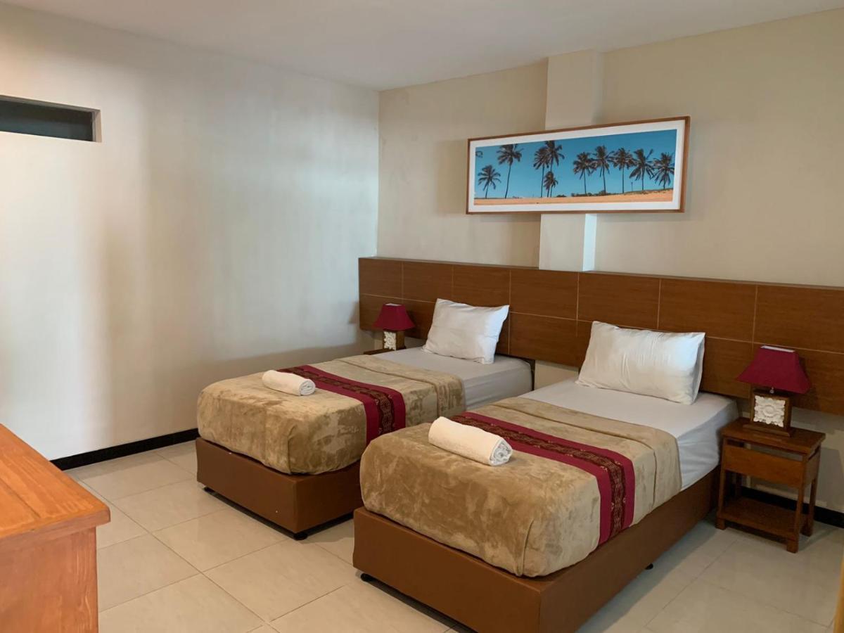 Kuta Suci Guesthouse Екстериор снимка