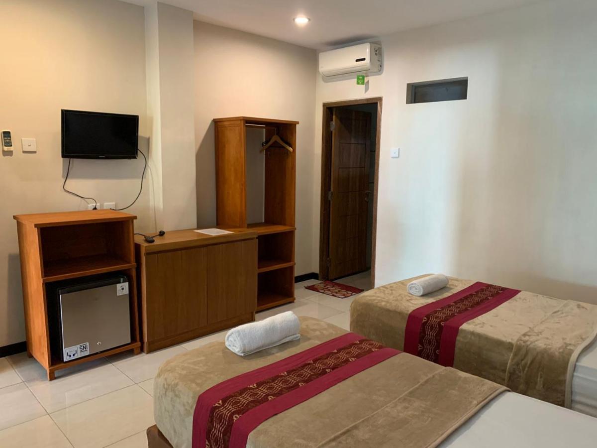 Kuta Suci Guesthouse Екстериор снимка