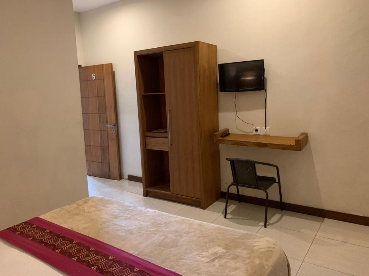 Kuta Suci Guesthouse Екстериор снимка