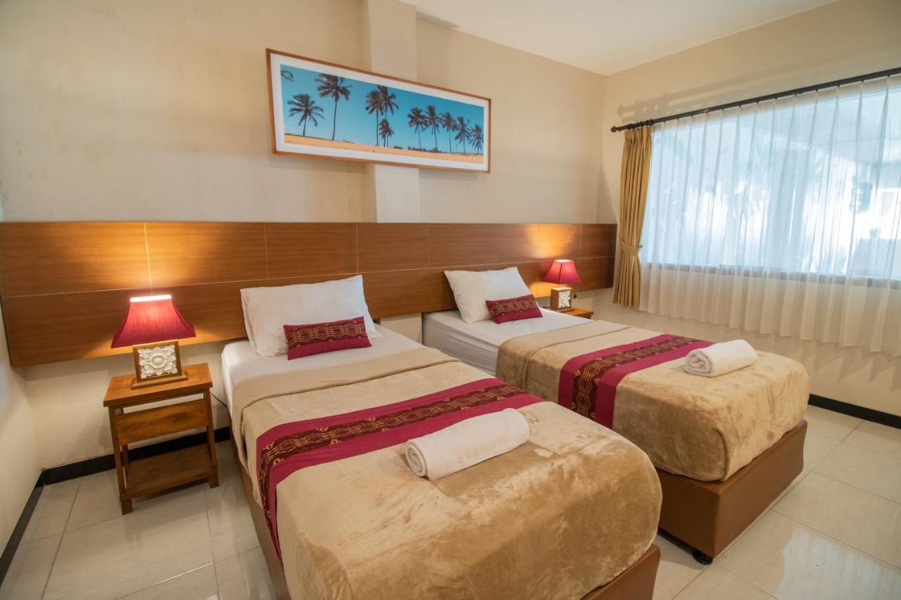 Kuta Suci Guesthouse Екстериор снимка