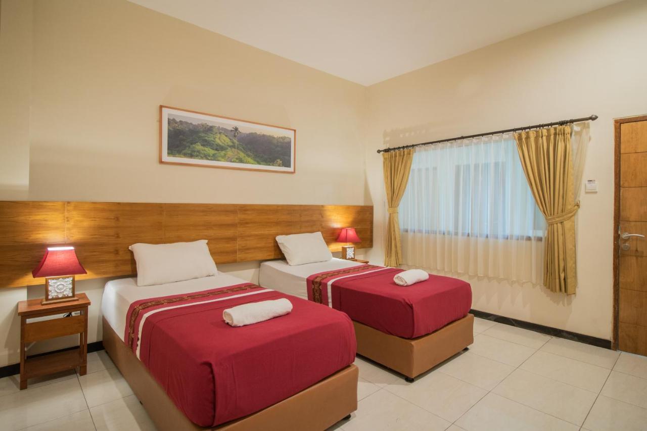 Kuta Suci Guesthouse Екстериор снимка