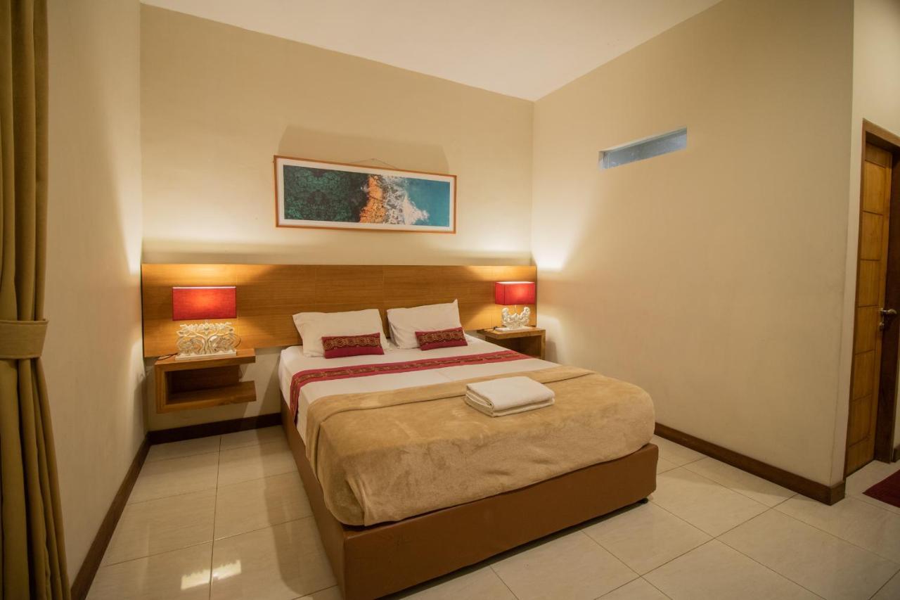 Kuta Suci Guesthouse Екстериор снимка