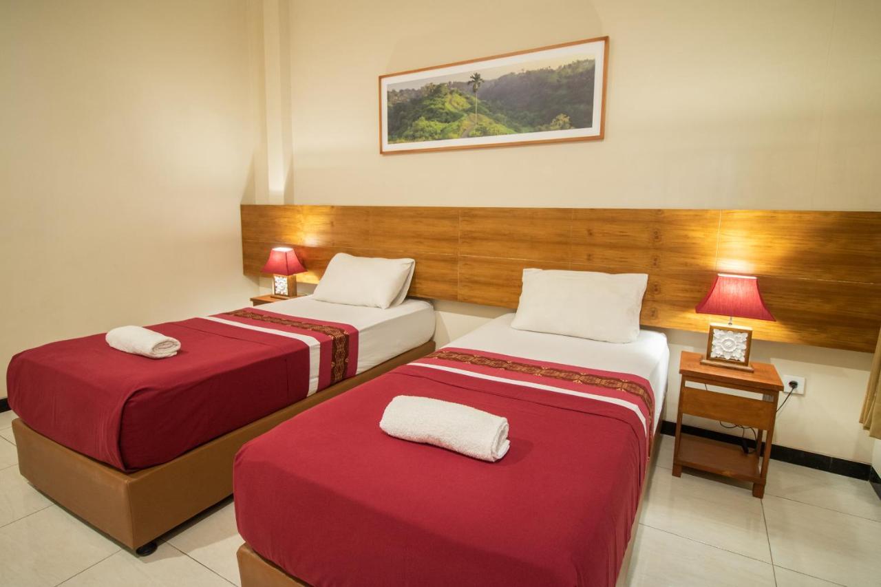 Kuta Suci Guesthouse Екстериор снимка