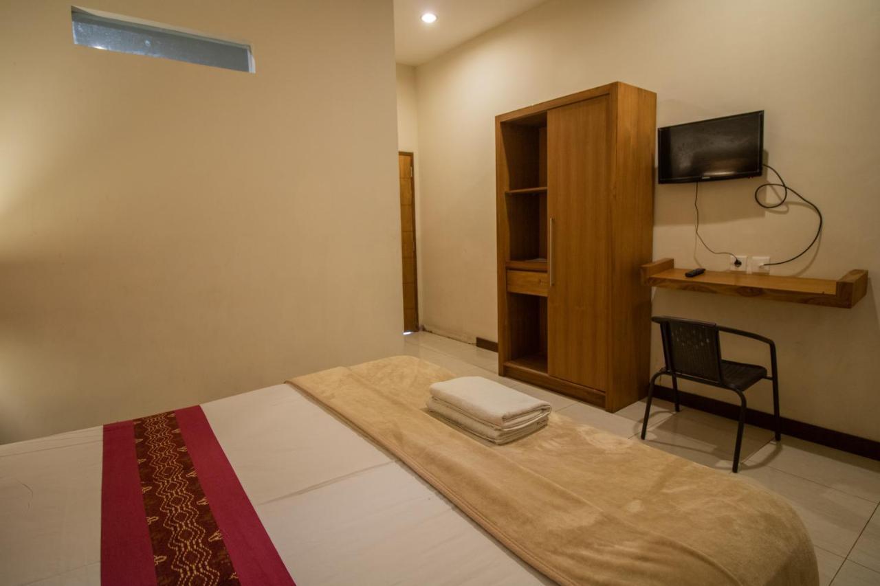Kuta Suci Guesthouse Екстериор снимка