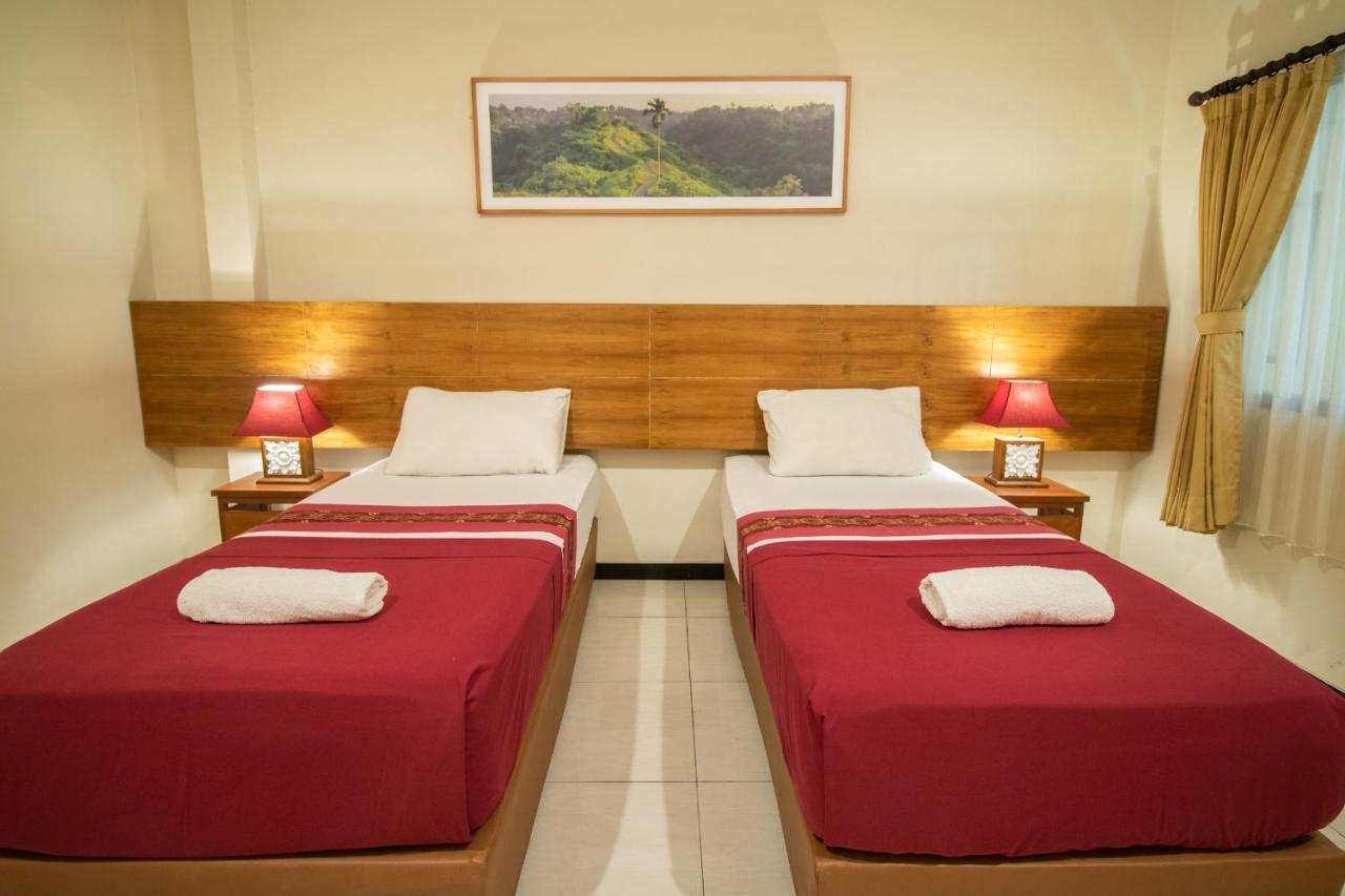 Kuta Suci Guesthouse Екстериор снимка