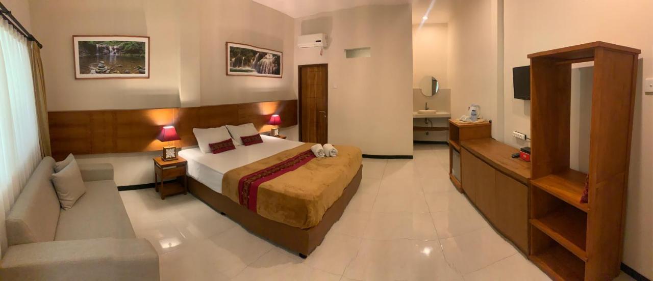 Kuta Suci Guesthouse Екстериор снимка