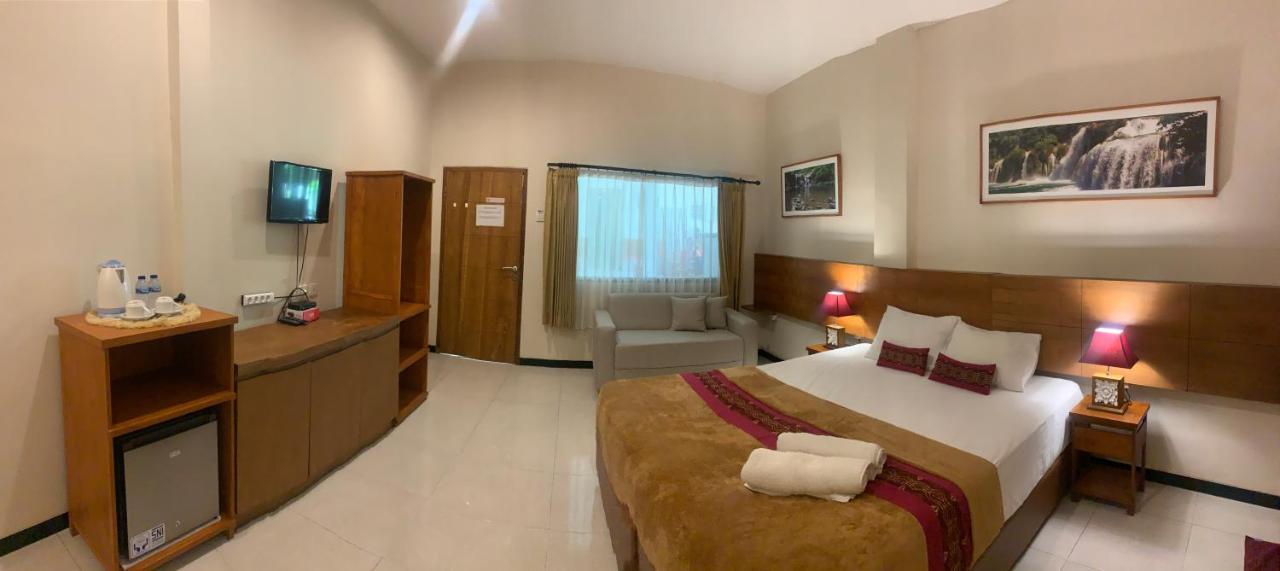 Kuta Suci Guesthouse Екстериор снимка