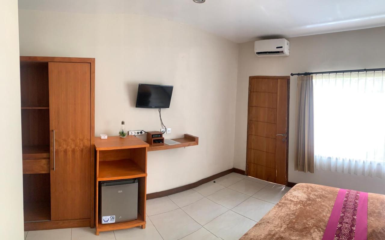 Kuta Suci Guesthouse Екстериор снимка