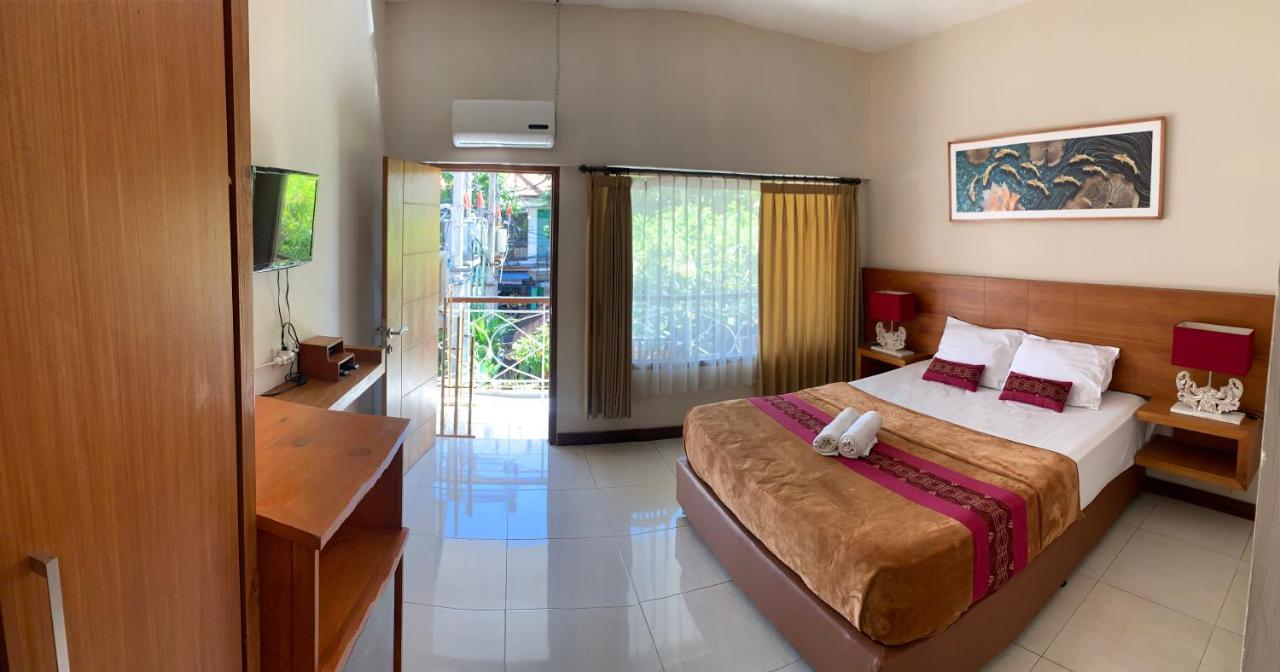Kuta Suci Guesthouse Екстериор снимка