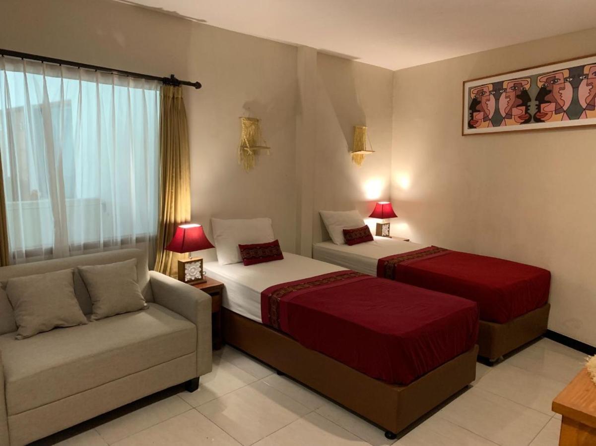 Kuta Suci Guesthouse Екстериор снимка