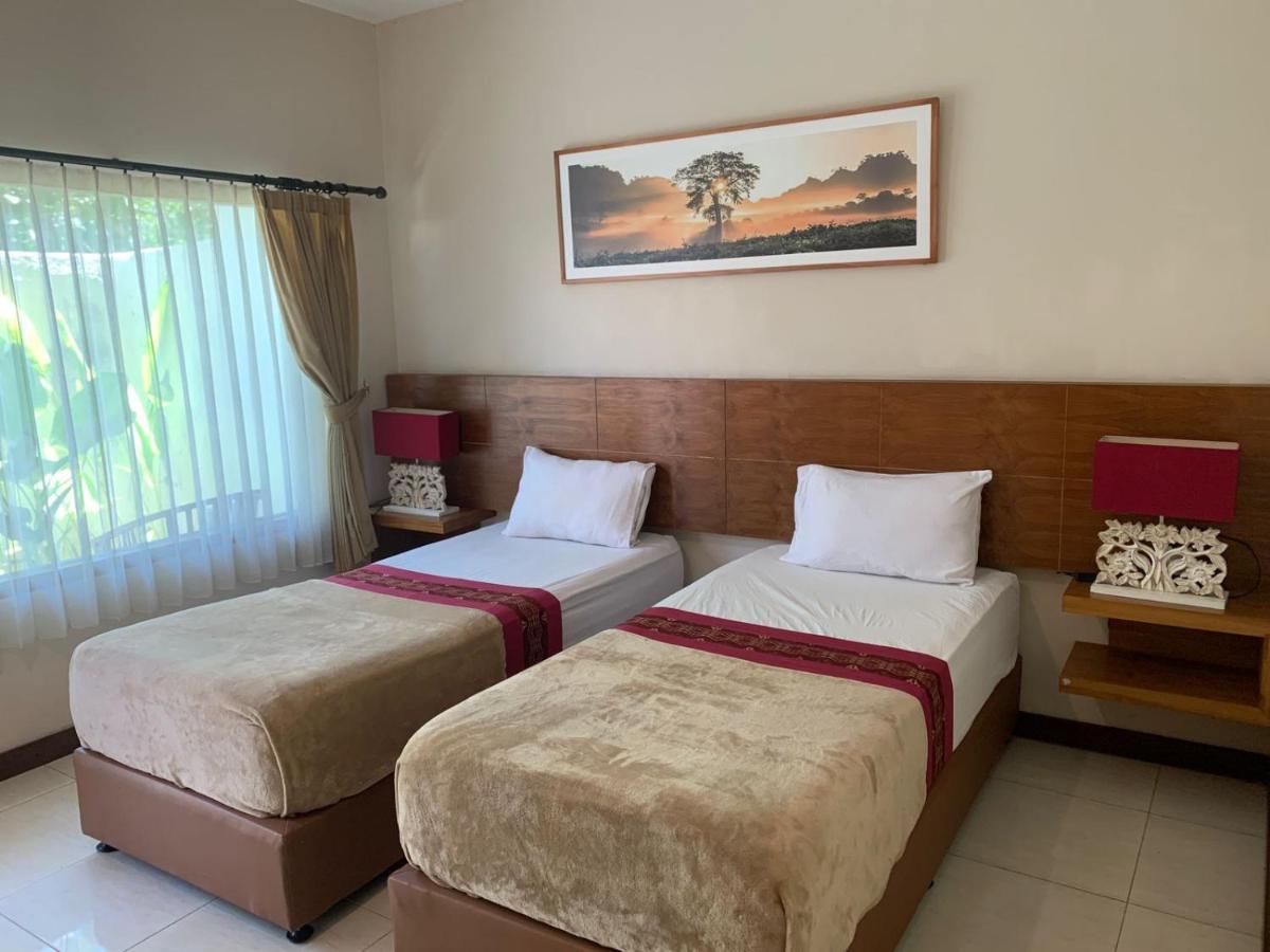Kuta Suci Guesthouse Екстериор снимка