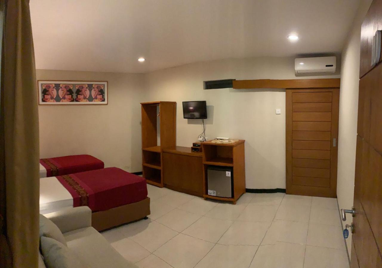 Kuta Suci Guesthouse Екстериор снимка