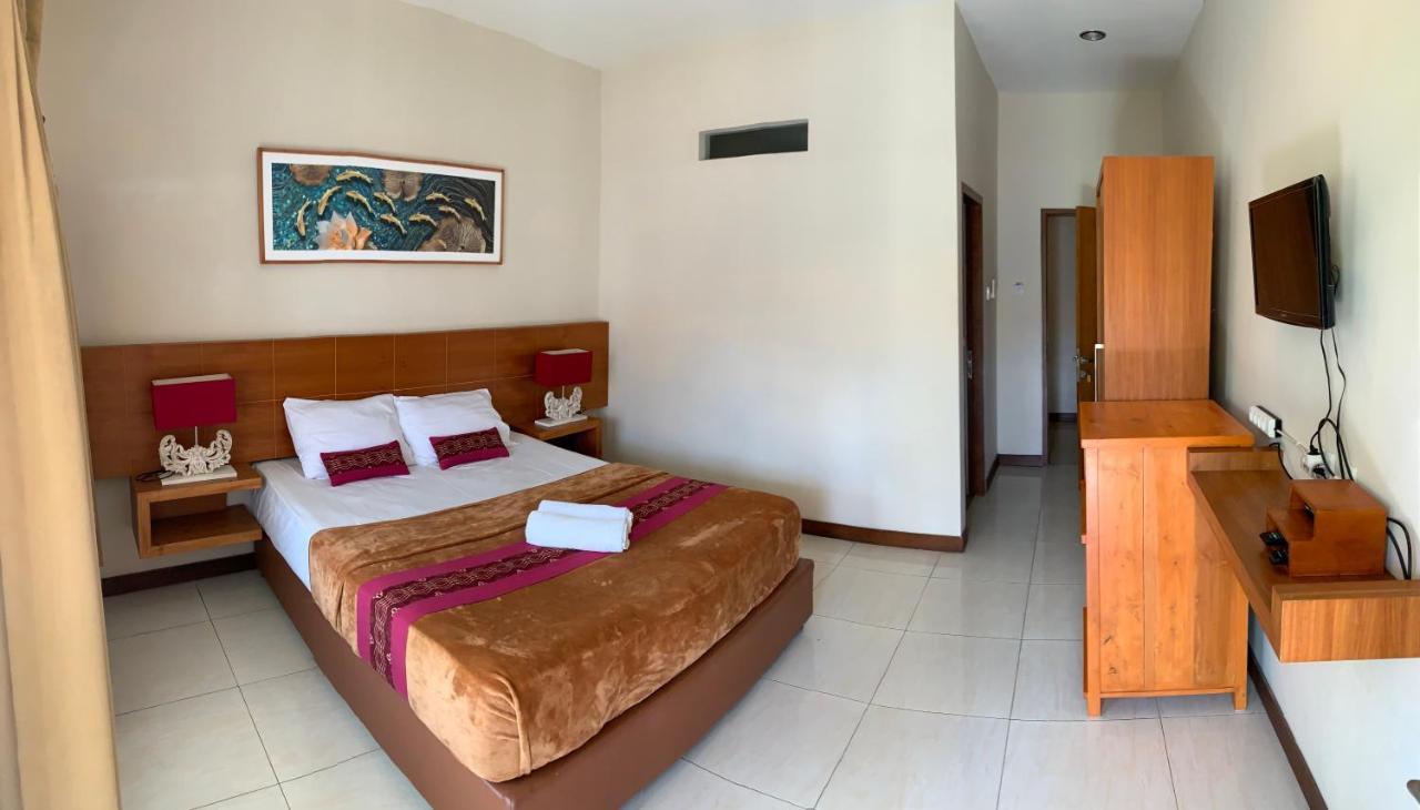 Kuta Suci Guesthouse Екстериор снимка