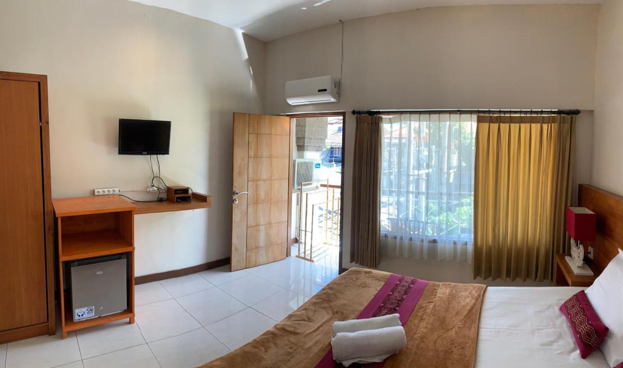 Kuta Suci Guesthouse Екстериор снимка