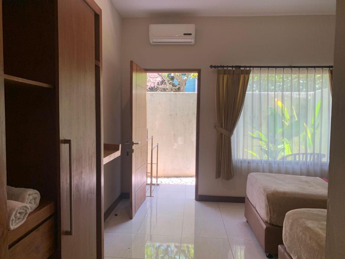 Kuta Suci Guesthouse Екстериор снимка