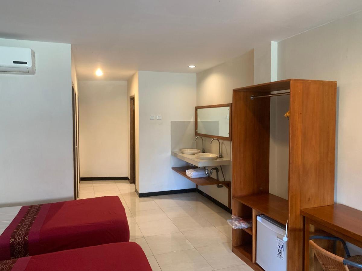 Kuta Suci Guesthouse Екстериор снимка