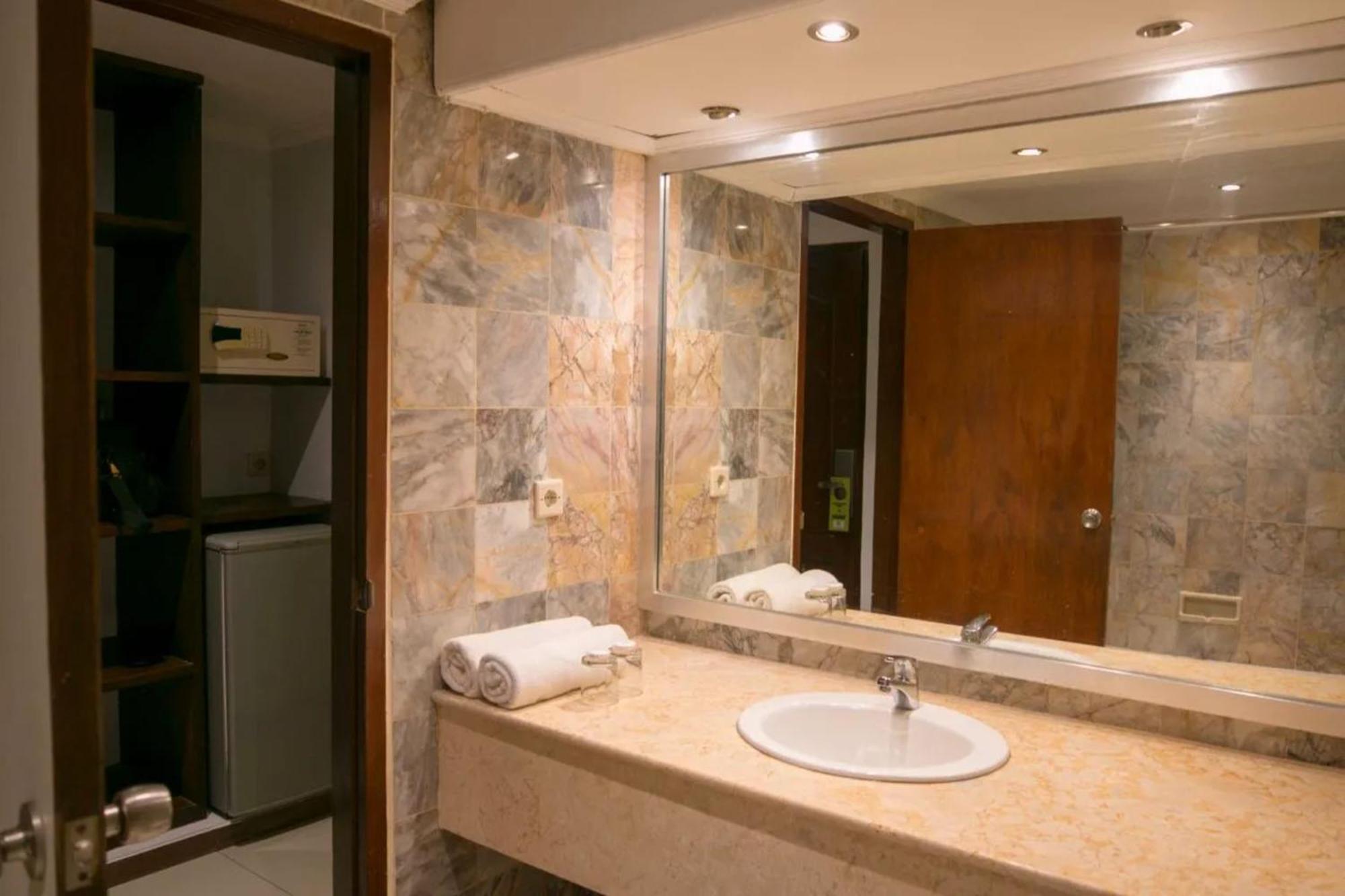 Kuta Suci Guesthouse Екстериор снимка